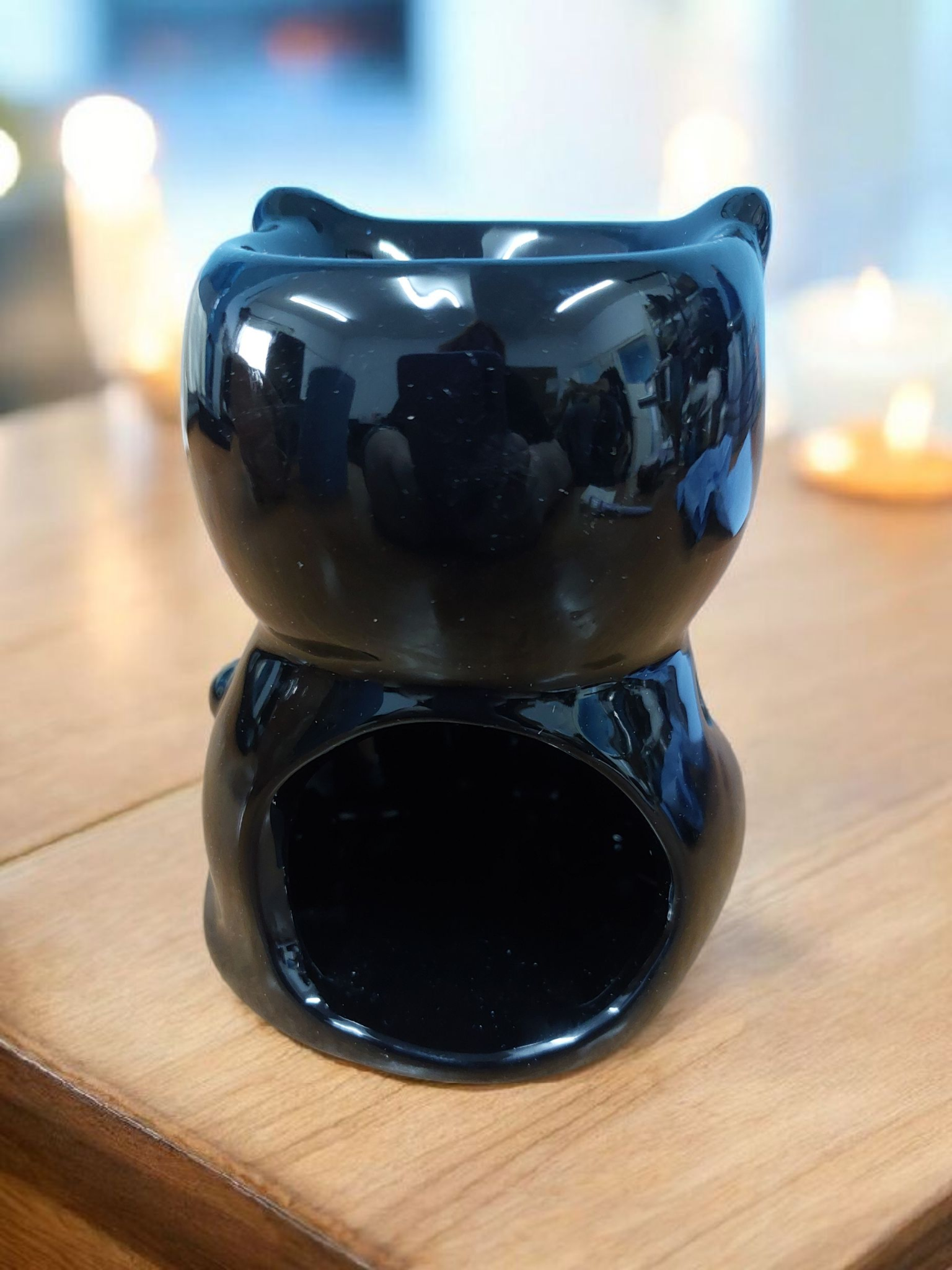 Back view of Black Cat Wax Burner with tealight opening and ceramic detail