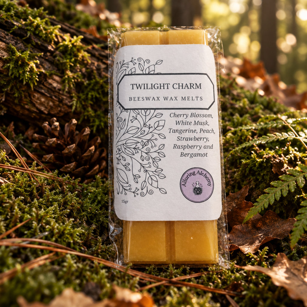 Twilight Charm Beeswax Wax Melts in a clear plastic wrapper with a white label, placed on a light wood surface.