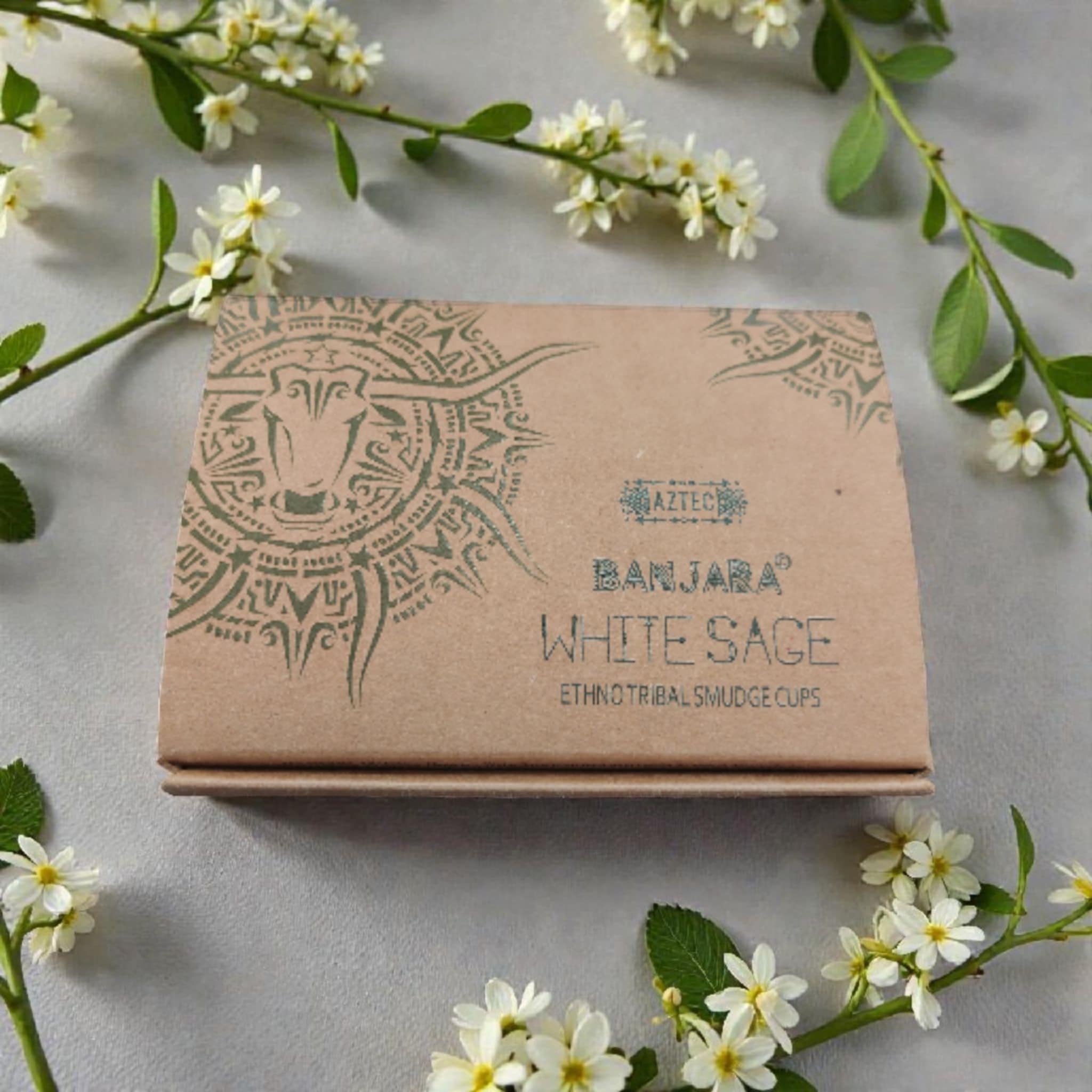 Banjara White Sage packaging with decorative elements on a light background