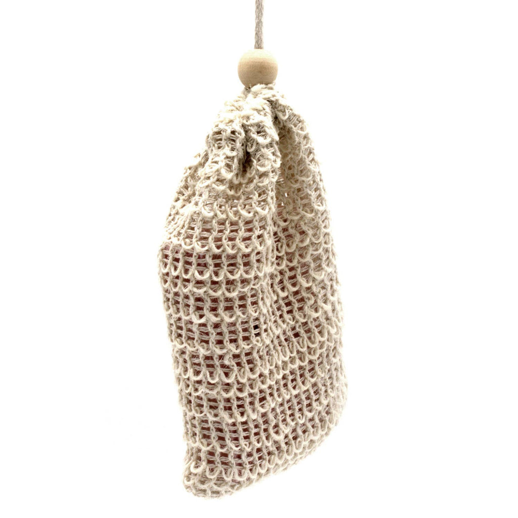 Textured beige bag with wooden bead on a white background