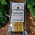 Packaged beeswax wax melts with 'Alluring Alchemy' branding on a natural background.