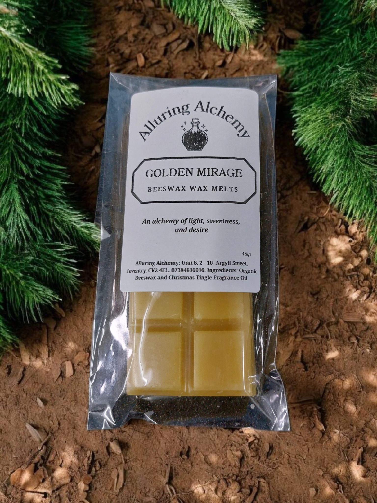 Packaged beeswax wax melts with 'Alluring Alchemy' branding on a natural background.