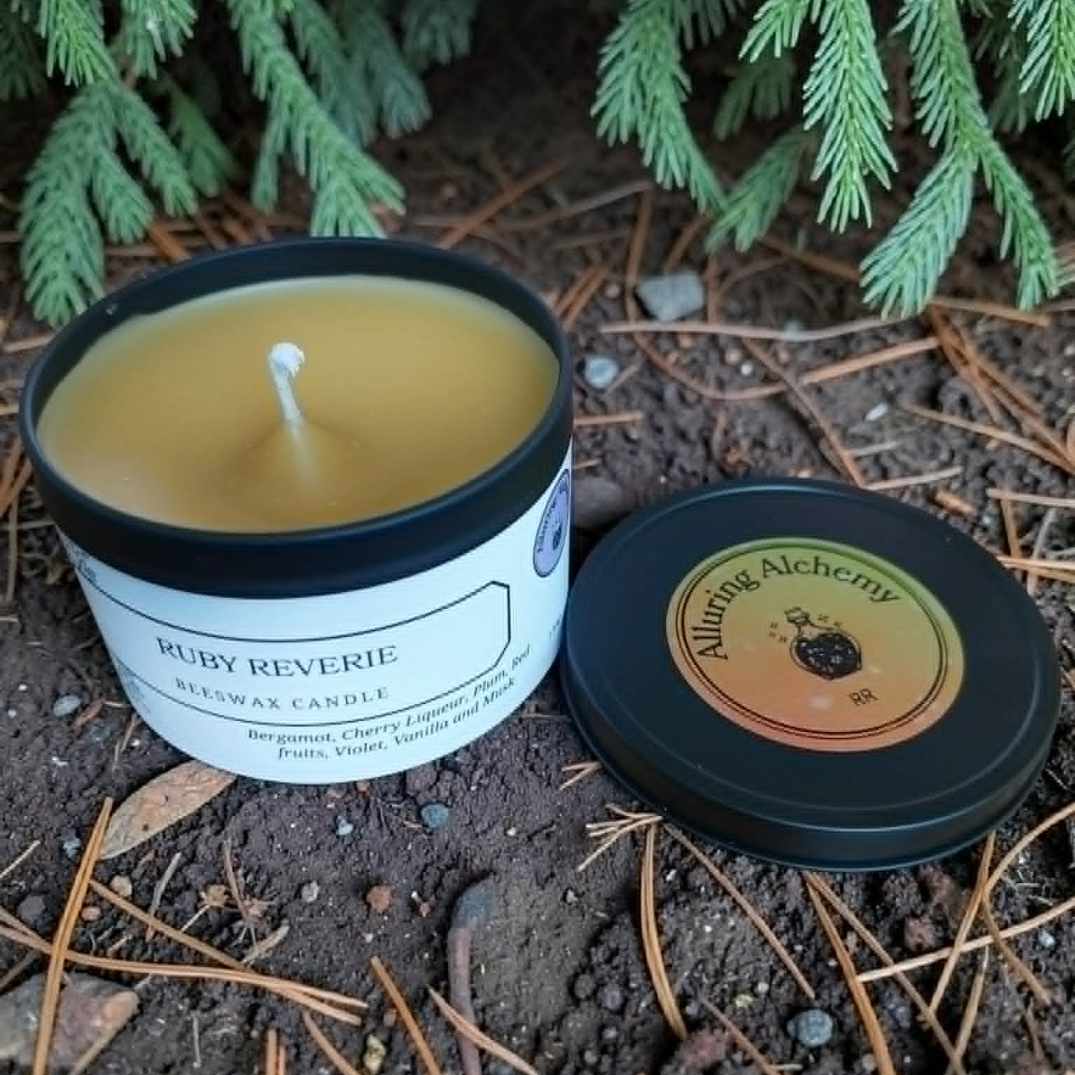 Candle in a tin with a label on a natural background